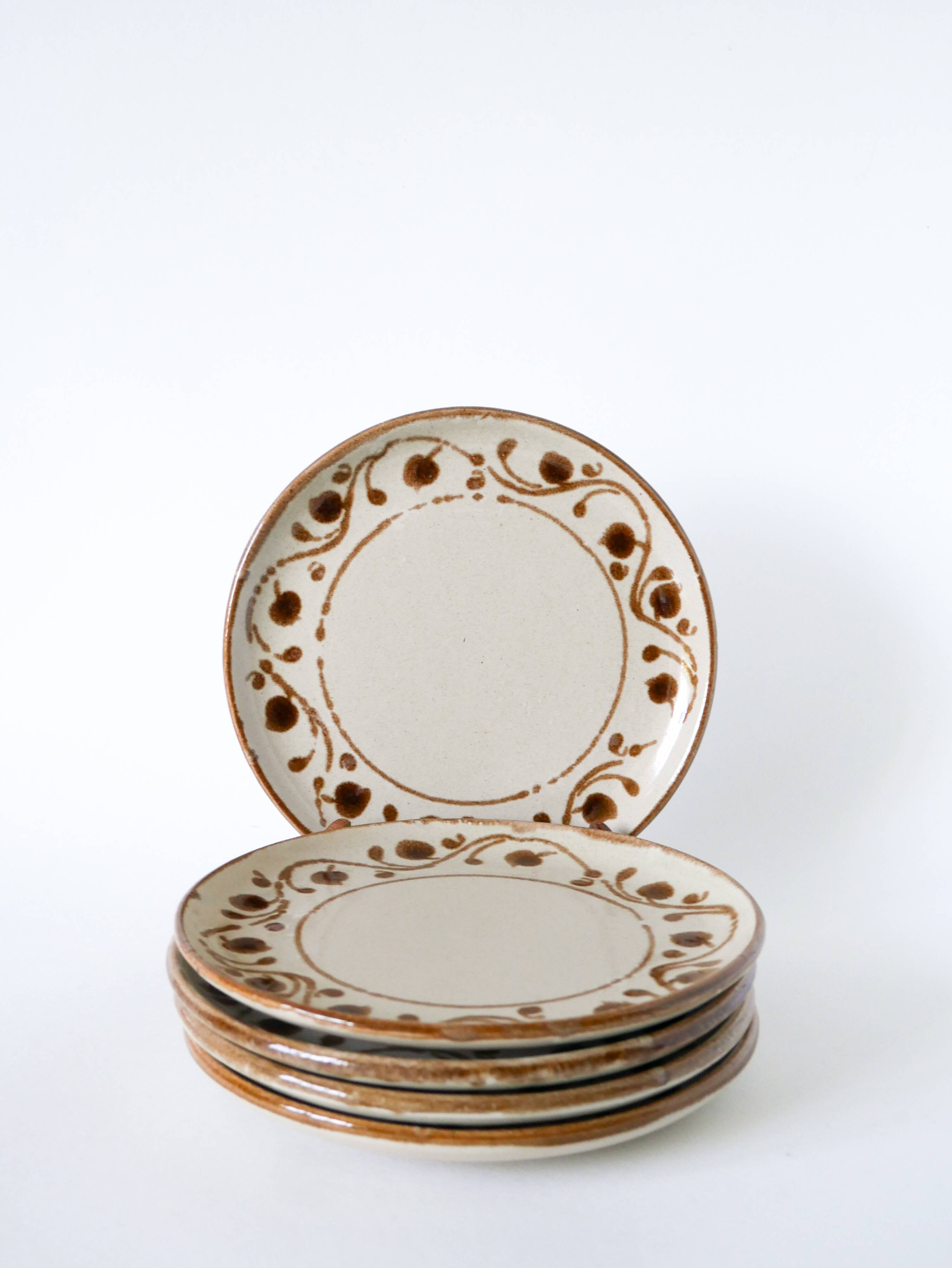 Set of 5 stoneware dessert plates with patterns, 1970.