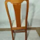 Set of 4 vintage chairs in stained wood and cream fabric.