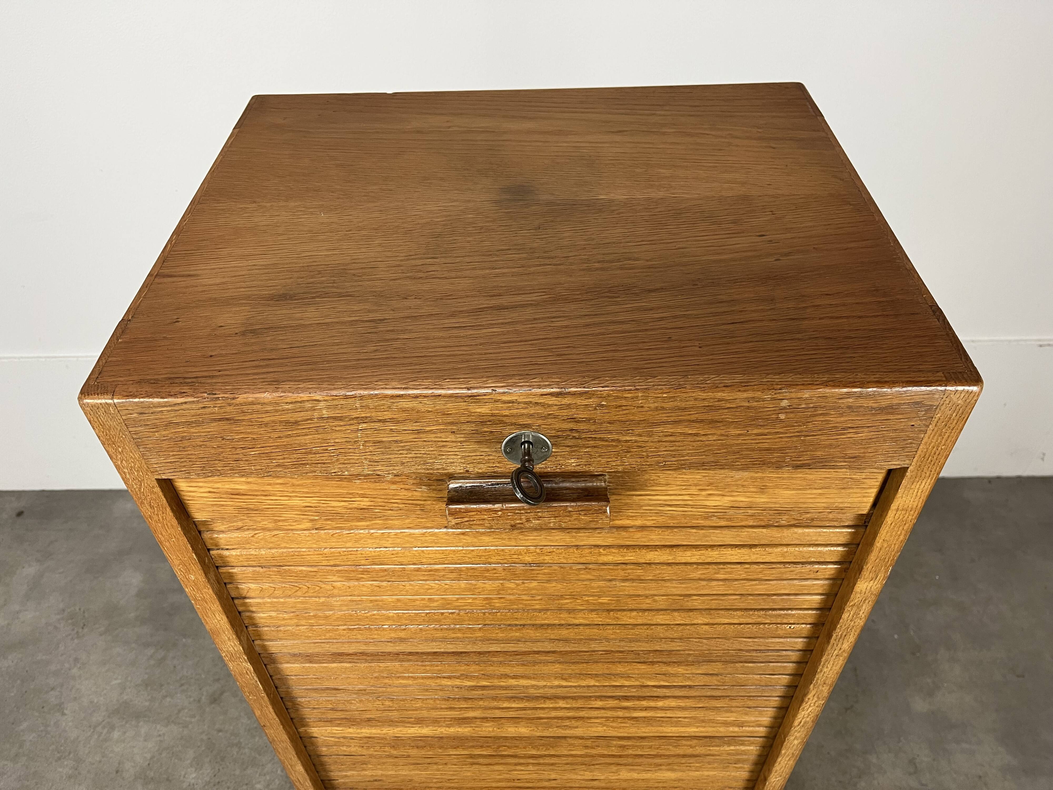 Filing cabinet with curtain, by trade