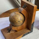 Pair of wooden bookends, rotating globes
