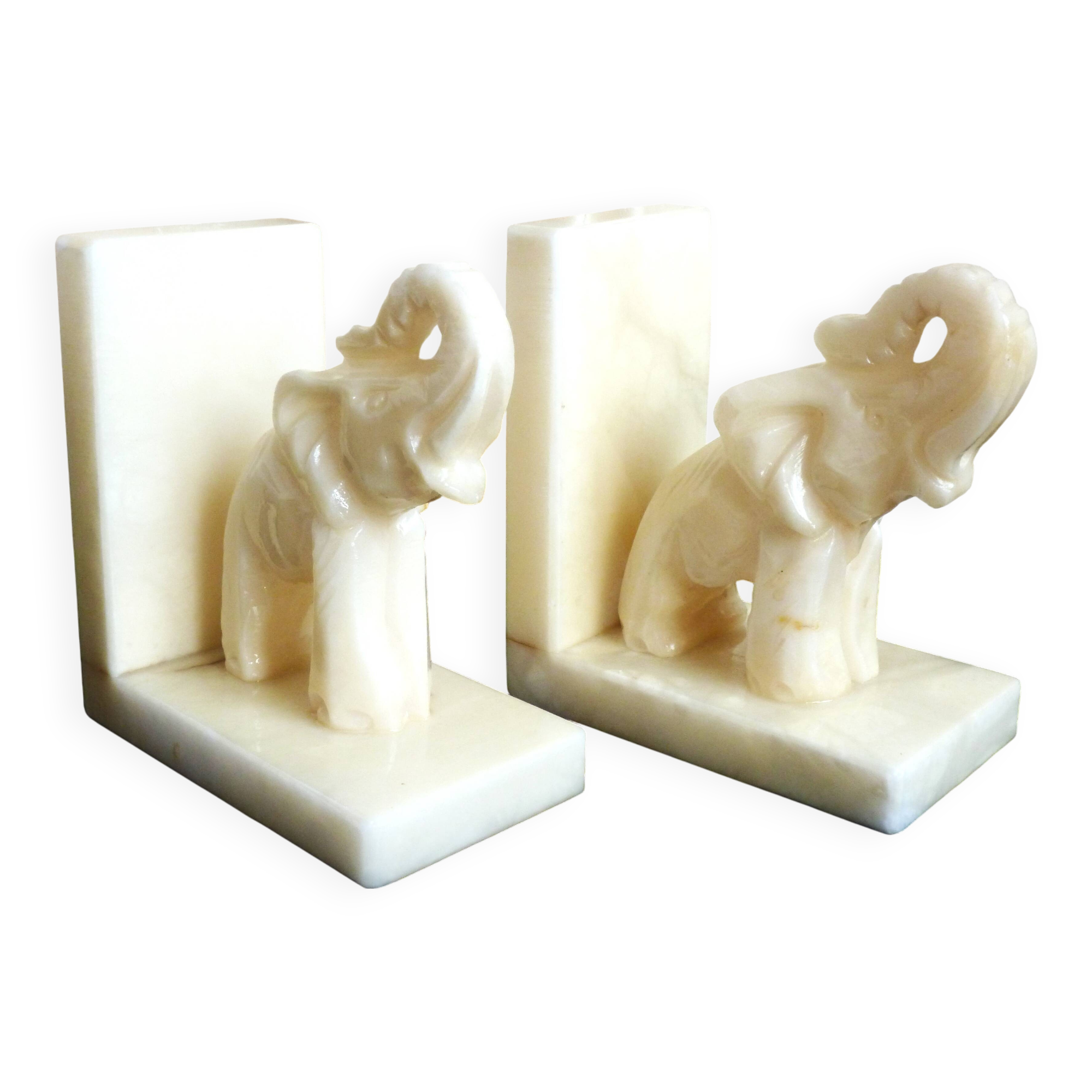 Pair of alabaster elephant bookends, library accessories