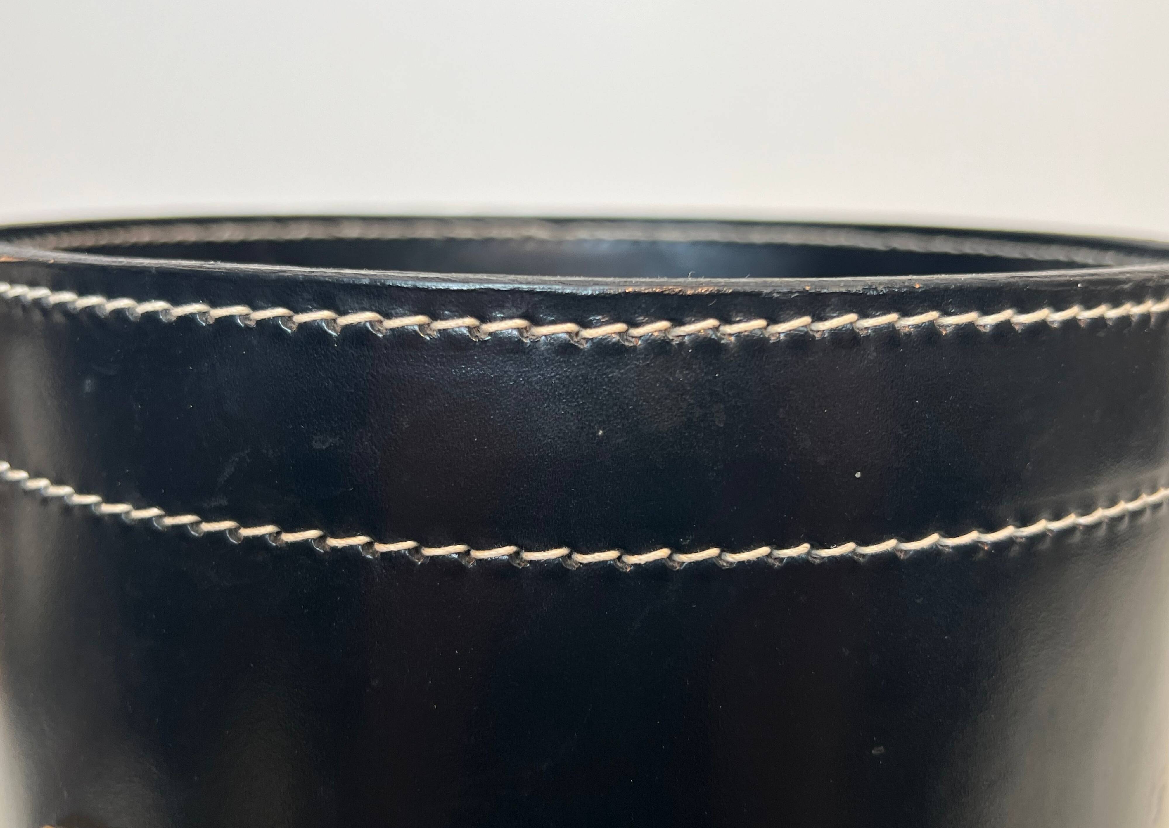 Black leather and brass desk basket