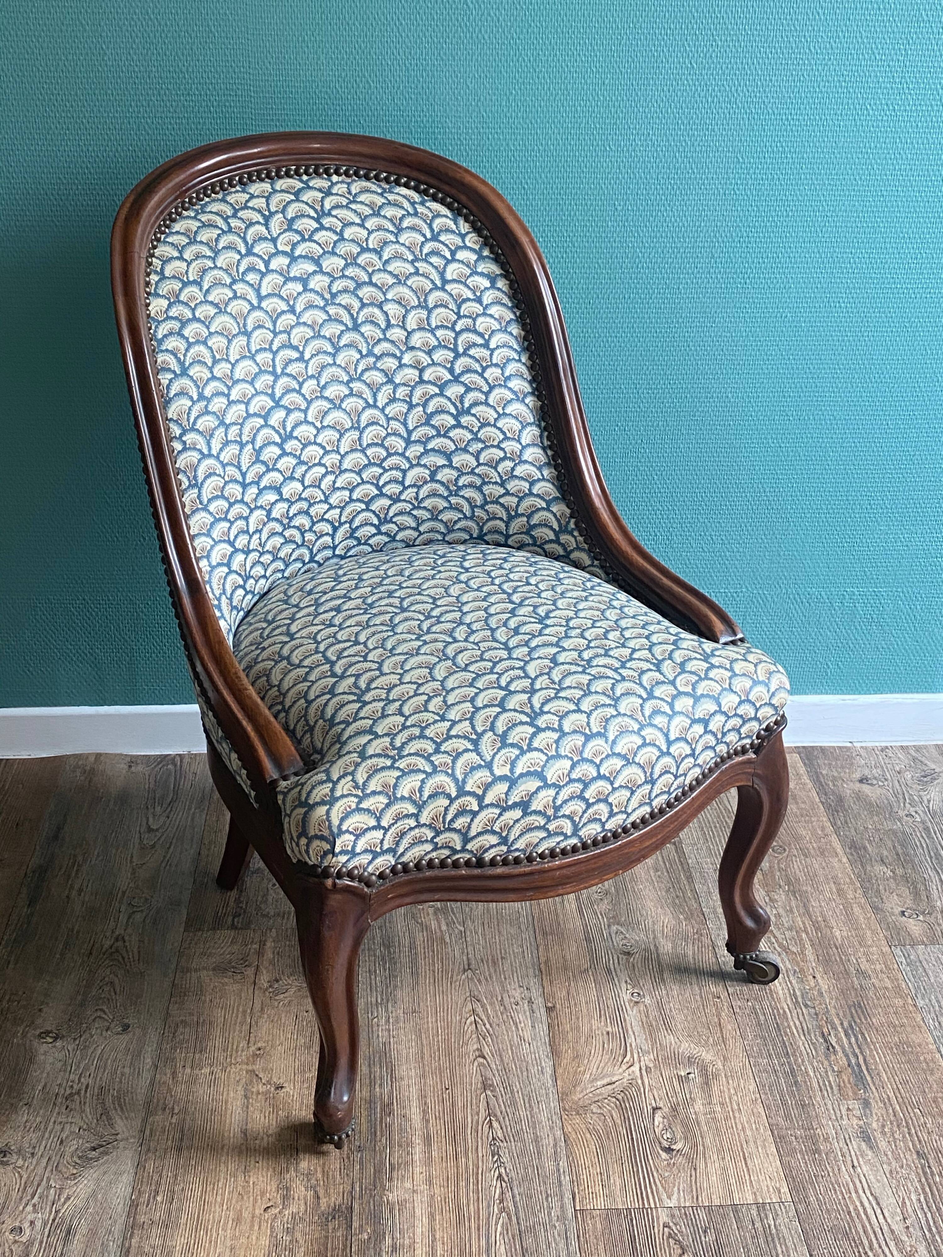 Blue shepherd's chair in mahogany era 19th