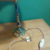 Silver metal lamp with its lampshade