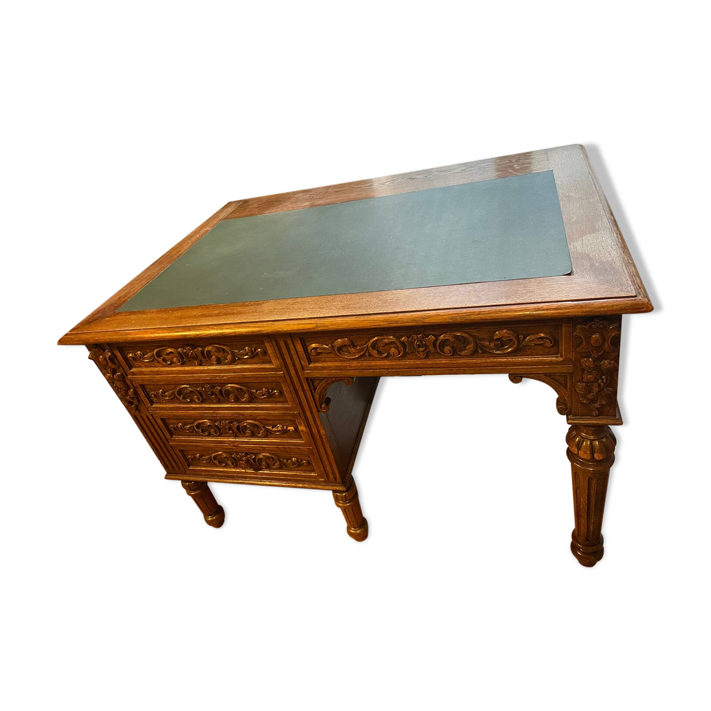 Solid wood desk and green leather writing pad