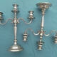 Pair of silver-colored metal candlesticks
