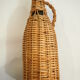 Bottle dressed in rattan