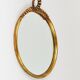 Round wall mirror in gilded wood, mid-century, C. Allodi & G. Subelli, Italy, 1950s.