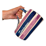 Blue and purple striped ceramic pitcher