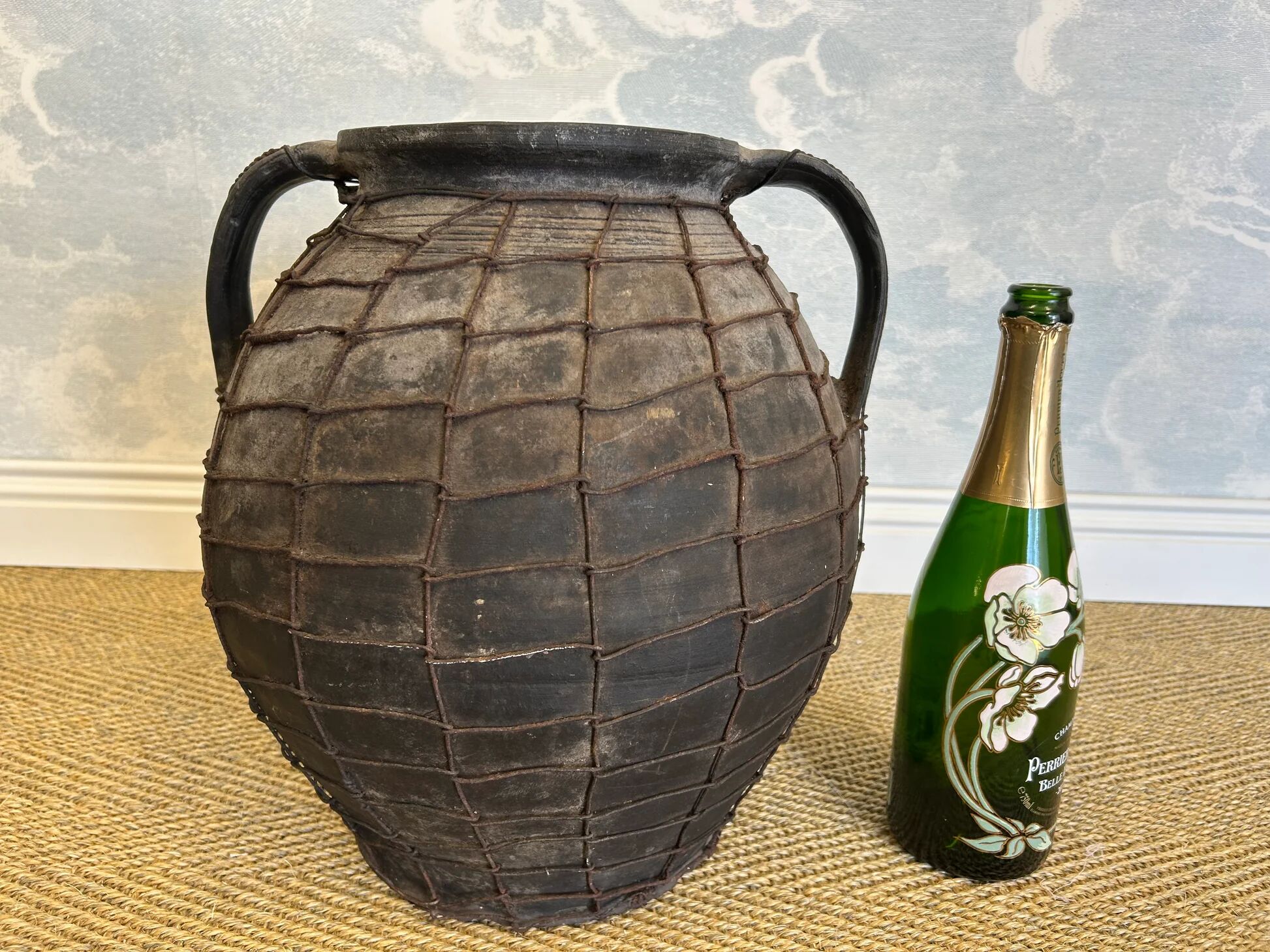 Artisan clay amphora with wire mesh, Romania, circa 1950