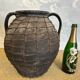 Artisan clay amphora with wire mesh, Romania, circa 1950