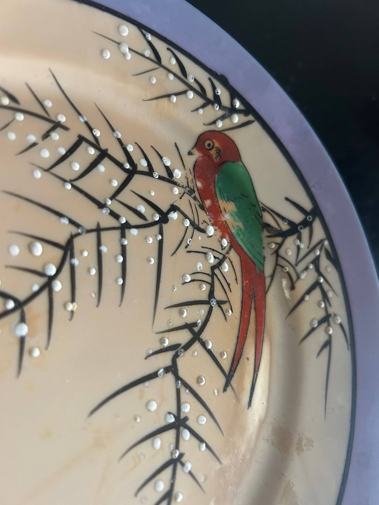 7 iridescent plates with bird decoration