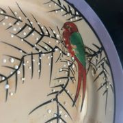 7 assiettes irisées à décor d'oiseau