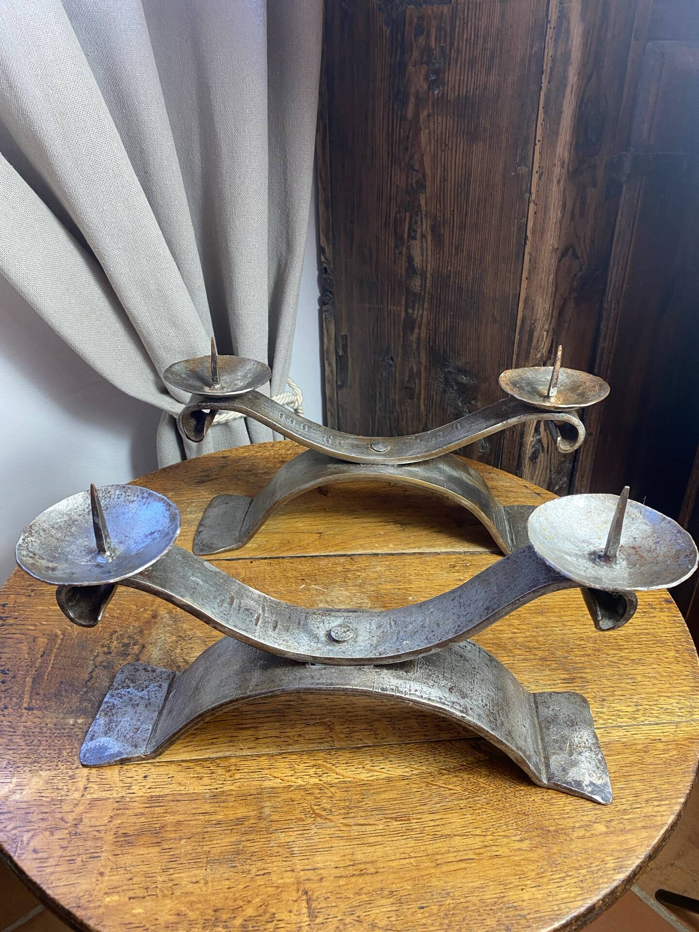 Brutalist wrought iron candlestick pair