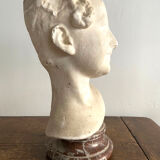 Plaster bust on marble stand