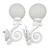 Pair of white enameled cast iron wall sconces, mid-20th century