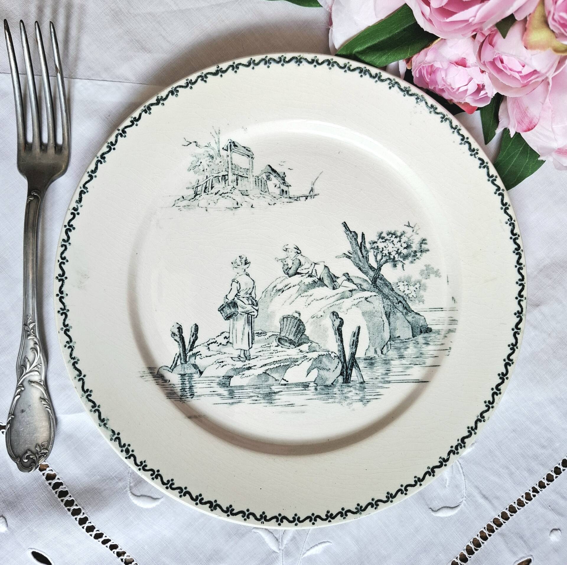 Old mismatched flat plates made of ironstone earthenware.