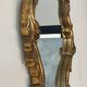 Old italian mirror in gilded plaster with leaf