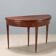 Console demi-lune antique en acajou avec un dessus ouvrant, 19e siècle.