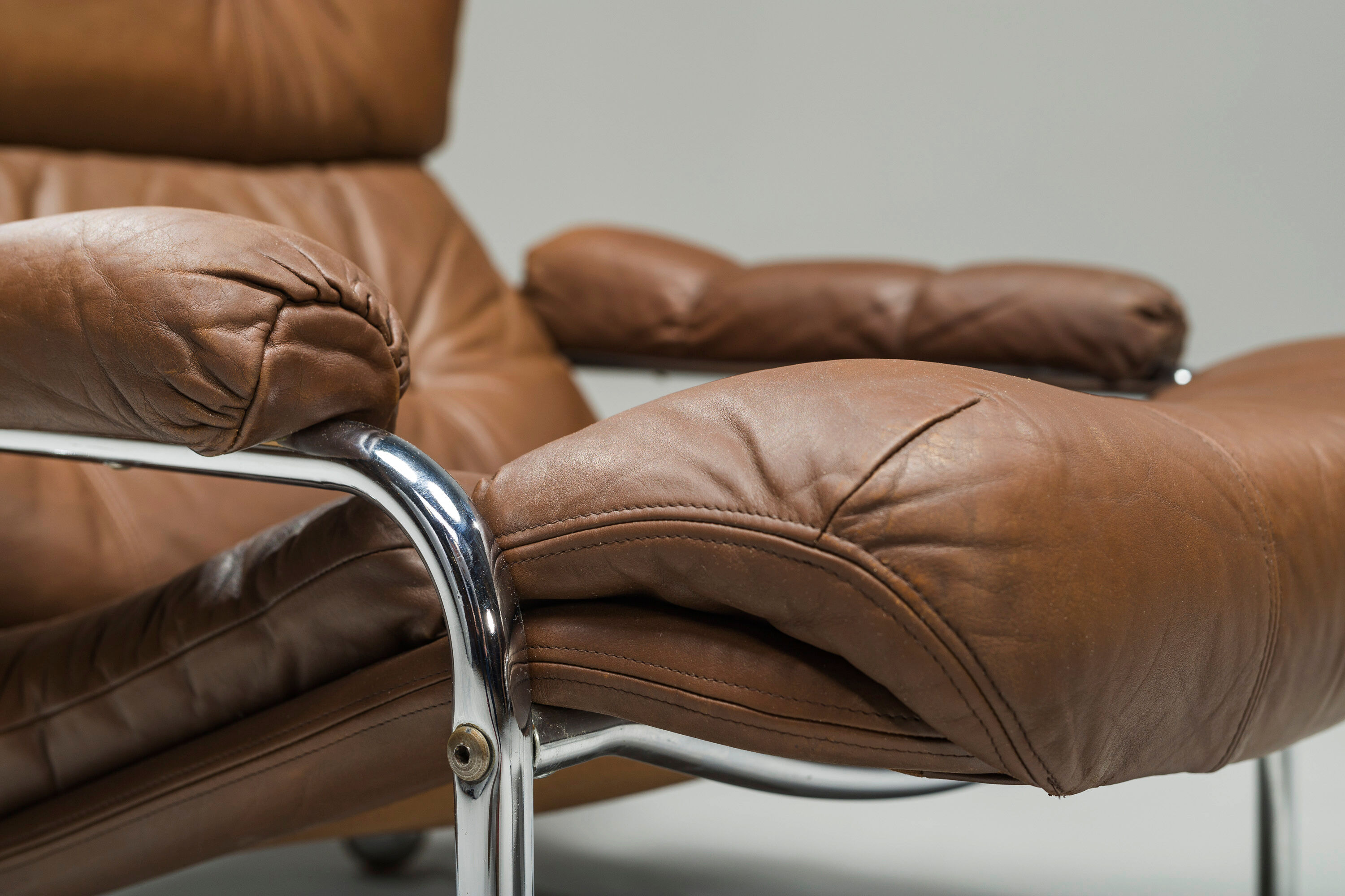 Swedish Lounge Chair and Ottoman in Chrome and Brown Leather by Scapa Rydaholm, 1960s, Set of 2