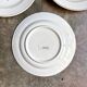 4 Longchamp brown earthenware dinner plates, "Tarente" service