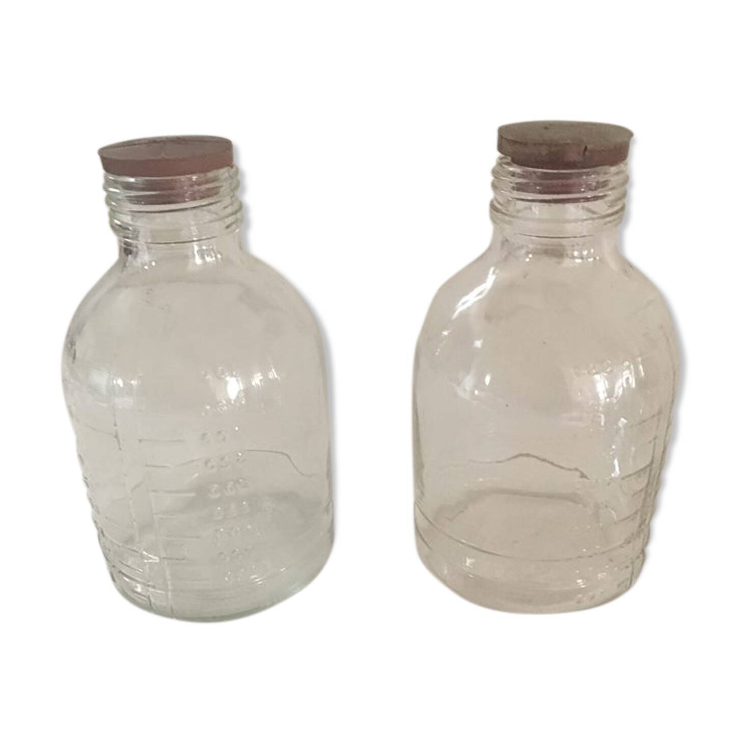 Two graduate former d apothecary bottles