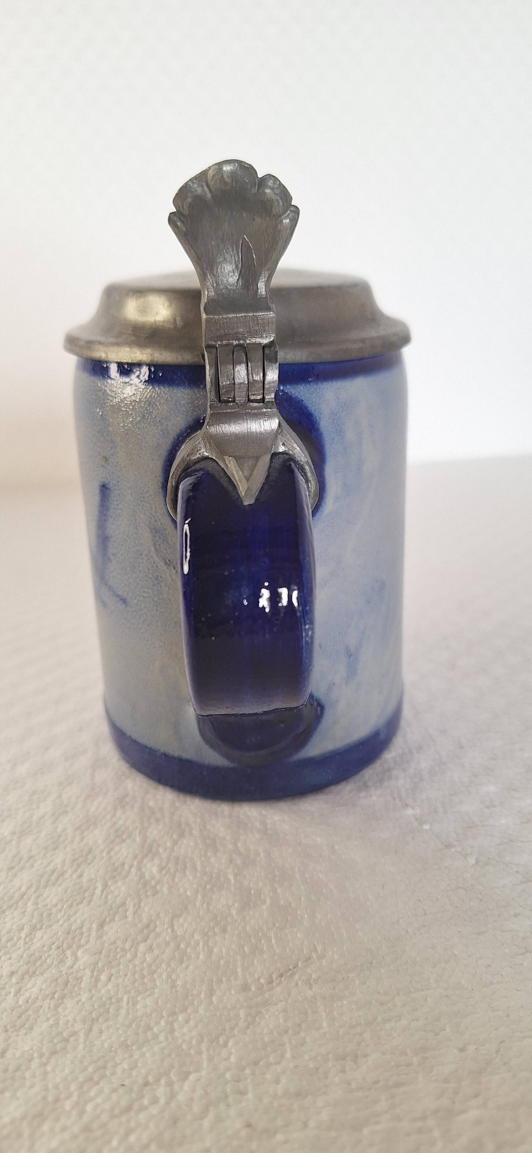 Beer mug with pure pewter lid