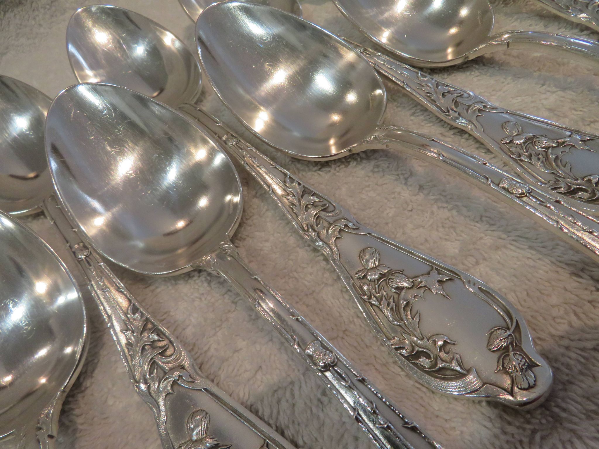 12 silver plated soup spoons by Boulenger, Art Nouveau Chardons
