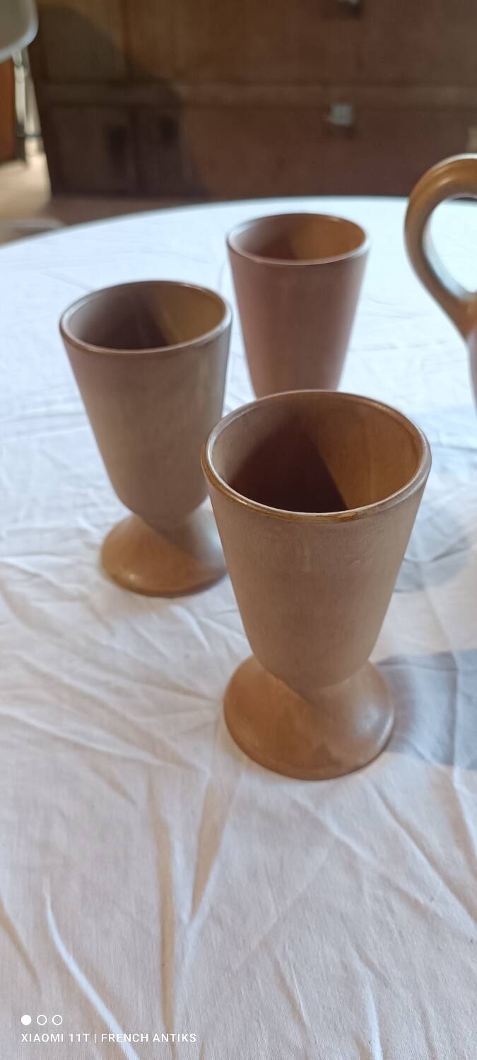 Iridescent carafe and 3 stoneware mazagrans from Digouin. Handmade work.
