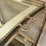 Neoclassical style rolling table in silver metal