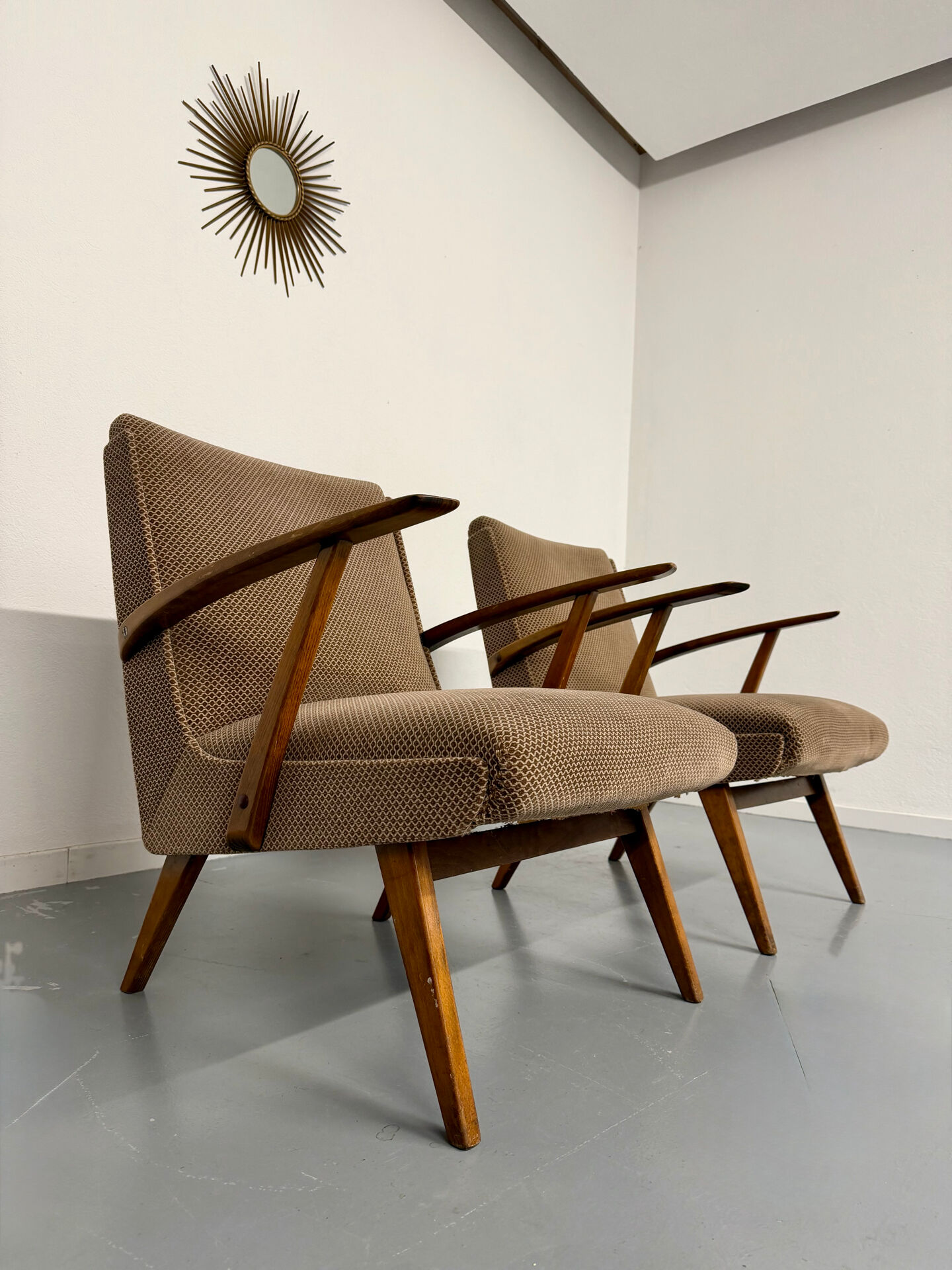 Set of 2 vintage wooden and fabric armchairs designed in the 1960s.