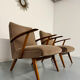 Set of 2 vintage wooden and fabric armchairs designed in the 1960s.