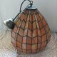 Antique stained glass and bronze pendant light