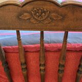 1 bed with a wooden frame and mattress