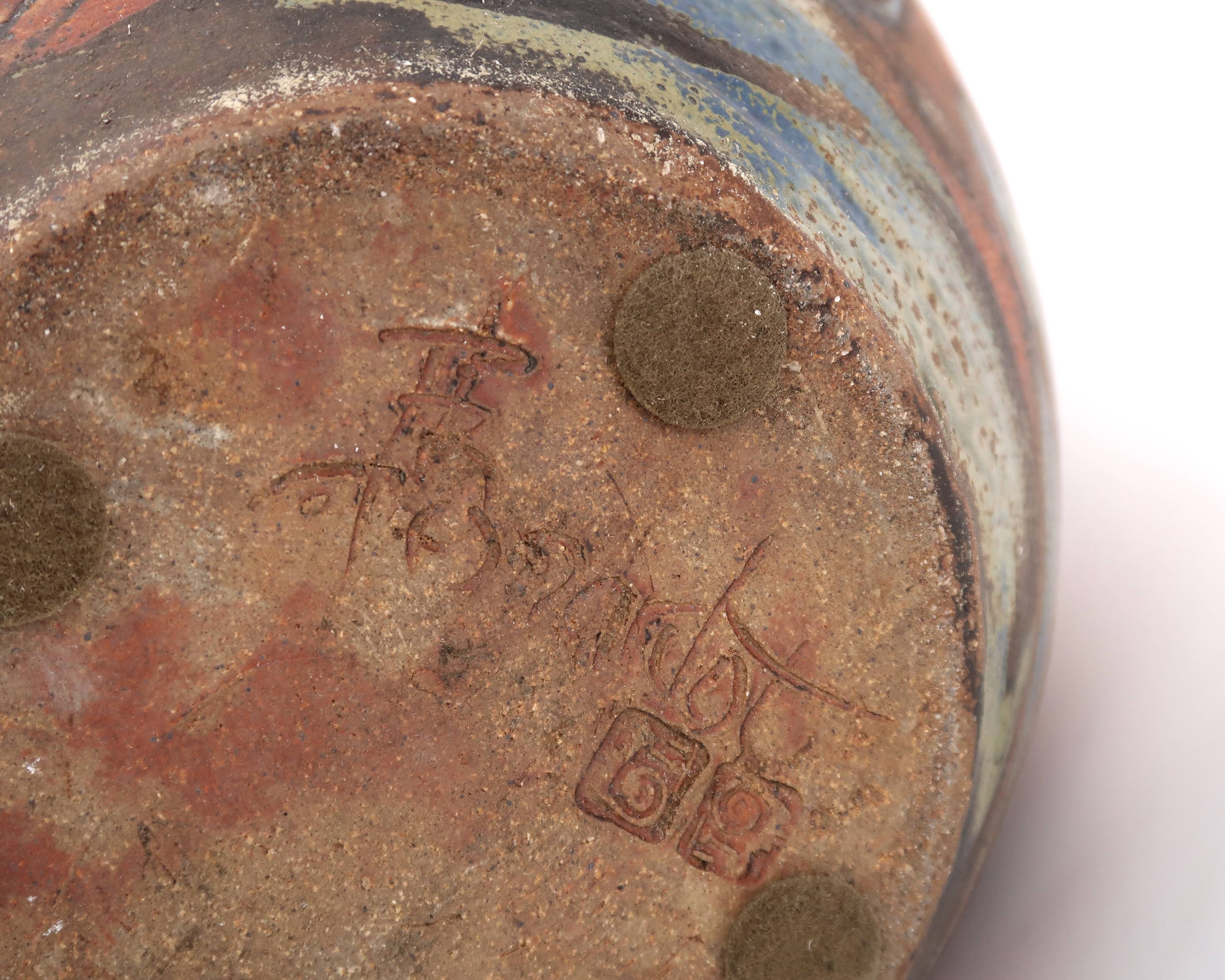 Decorated vase with woman, bathing scene.