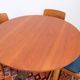 1960s/70s-style teak dining table by ASKO, with a retro vintage design.
