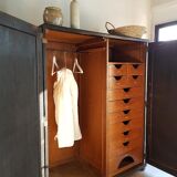 Old black wardrobe - wooden drawers and labels of origin