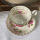 Porcelain cup and sub-cup "November" stamped "Royal Albert"