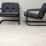Pair of Prisunic edition armchairs, tubular steel and foam cushions, France, 1973