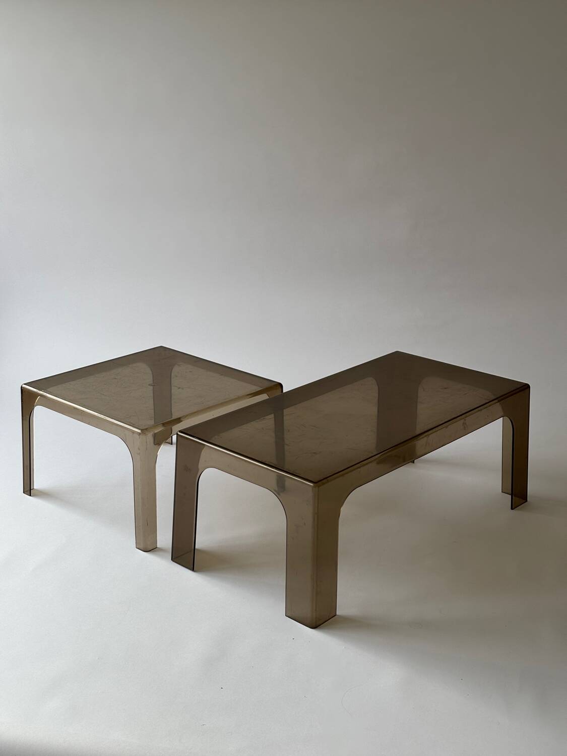 Smoked plastic coffee tables 1970