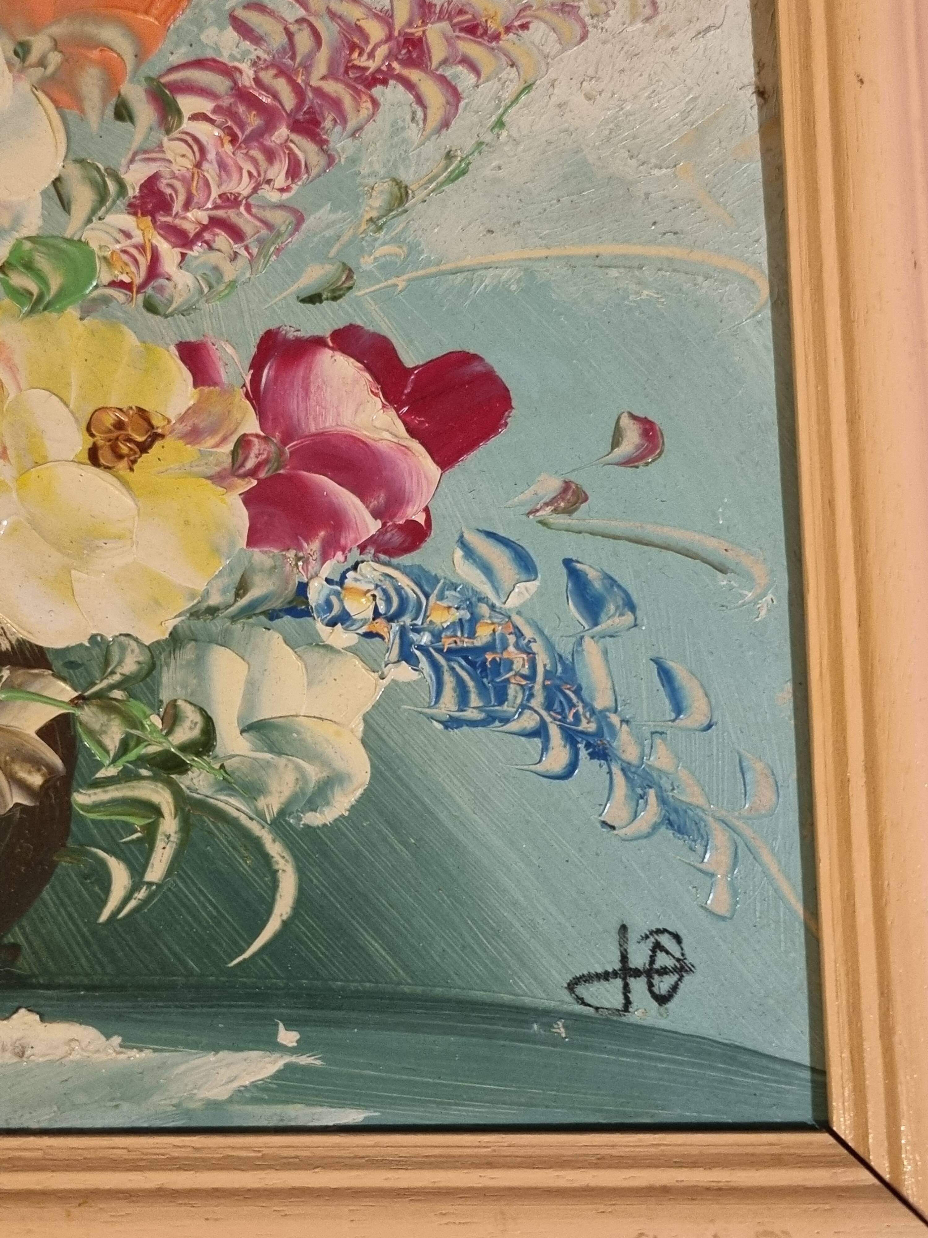 Oil painting of a bouquet of flowers.