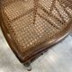 Pair of N2 antique caned and wooden chairs from the 1900s.