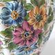 Antique vase with floral decoration in enamelled earthenware – timeless charm