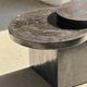 Brown petrified wood coffee table from Indonesia with a double circular top.