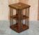 Rotating library table in mahogany and satinwood, Sheraton Revival style.