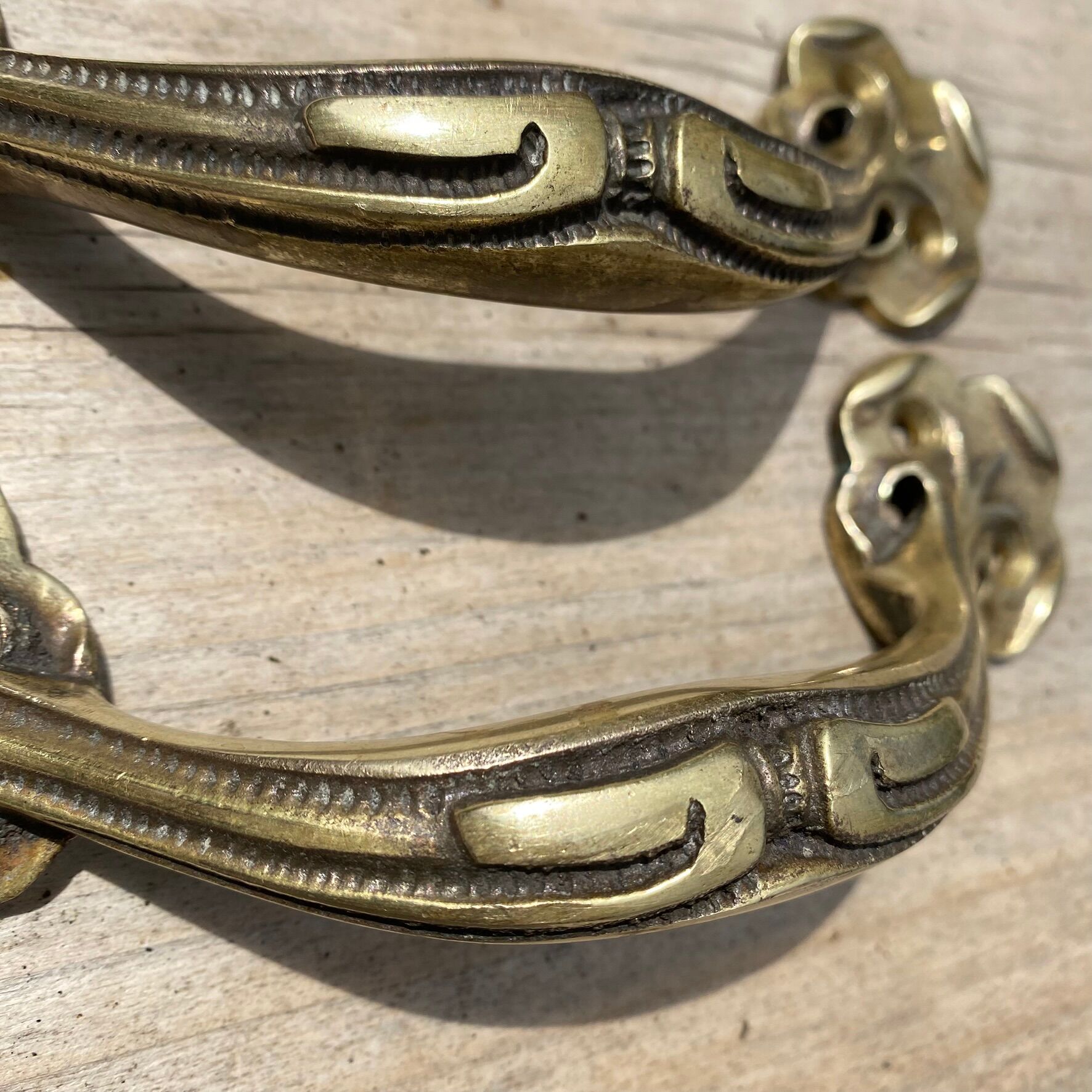 Pair of antique Art Nouveau brass handles