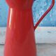 Red enamelled broc
