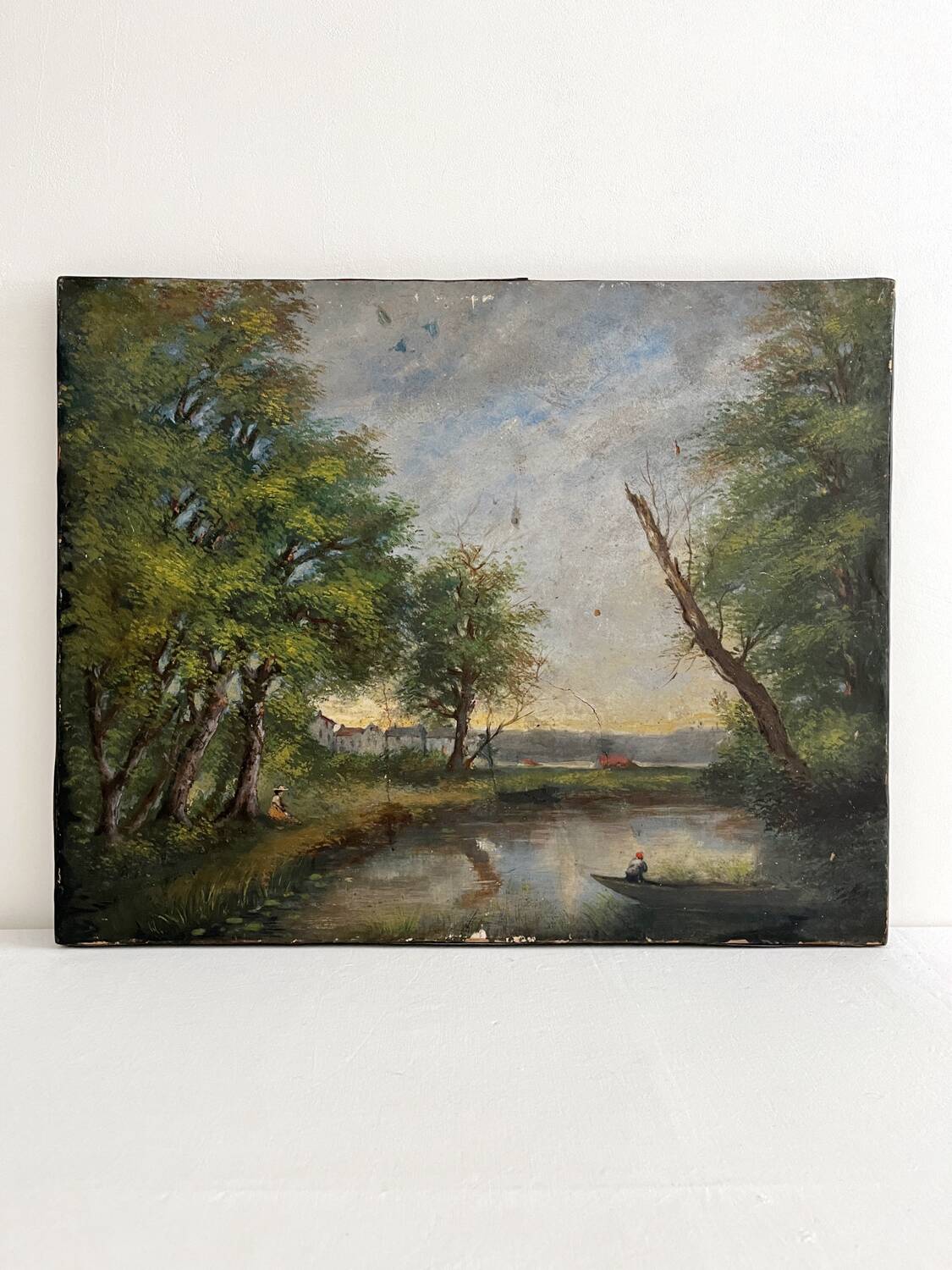 Old oil painting on canvas of a landscape by the pond.