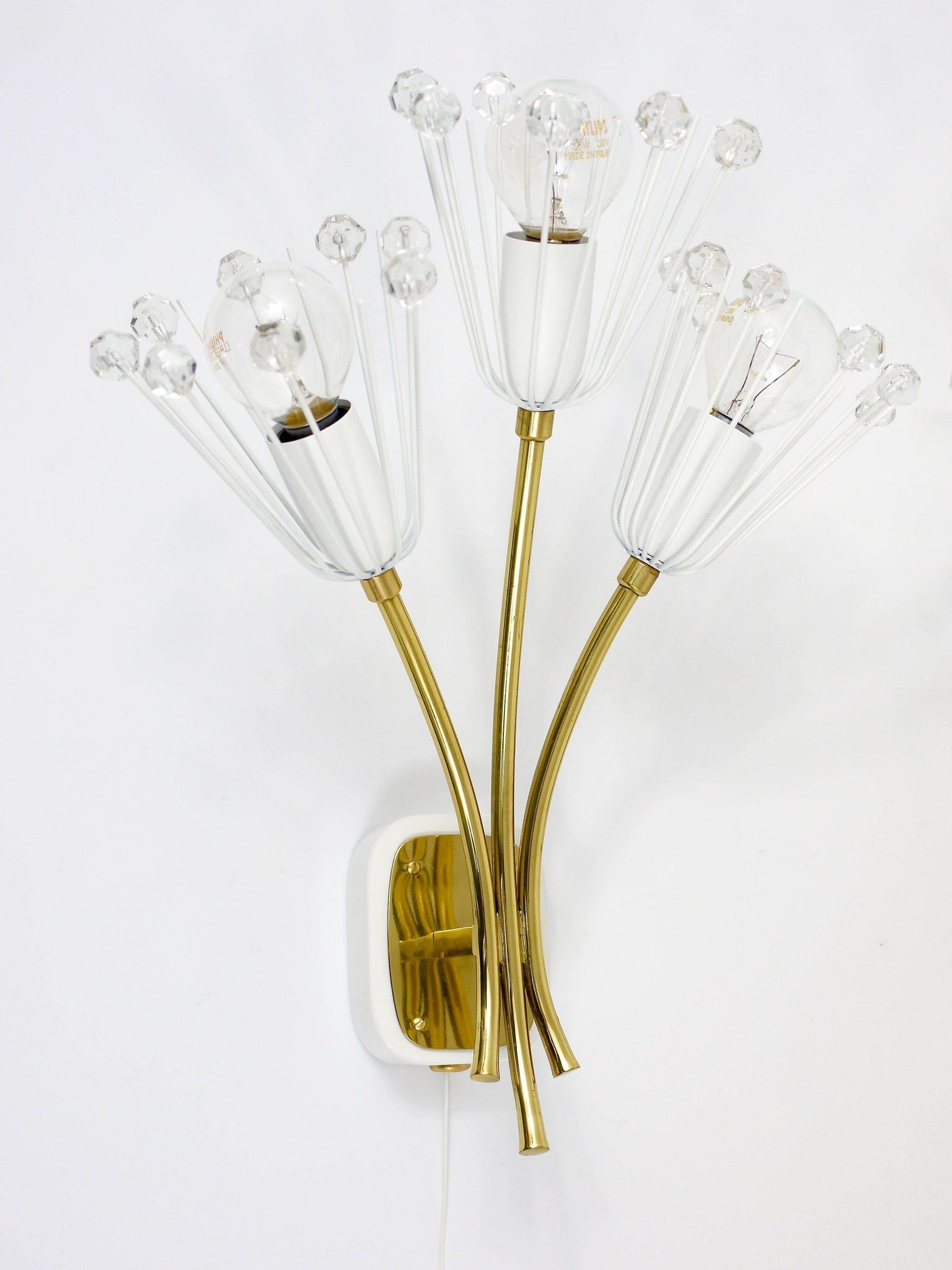 Pair of mid-century wall sconces in brass with flowers, Emil Stejnar, Rupert Nikoll, Austria, 1950s.