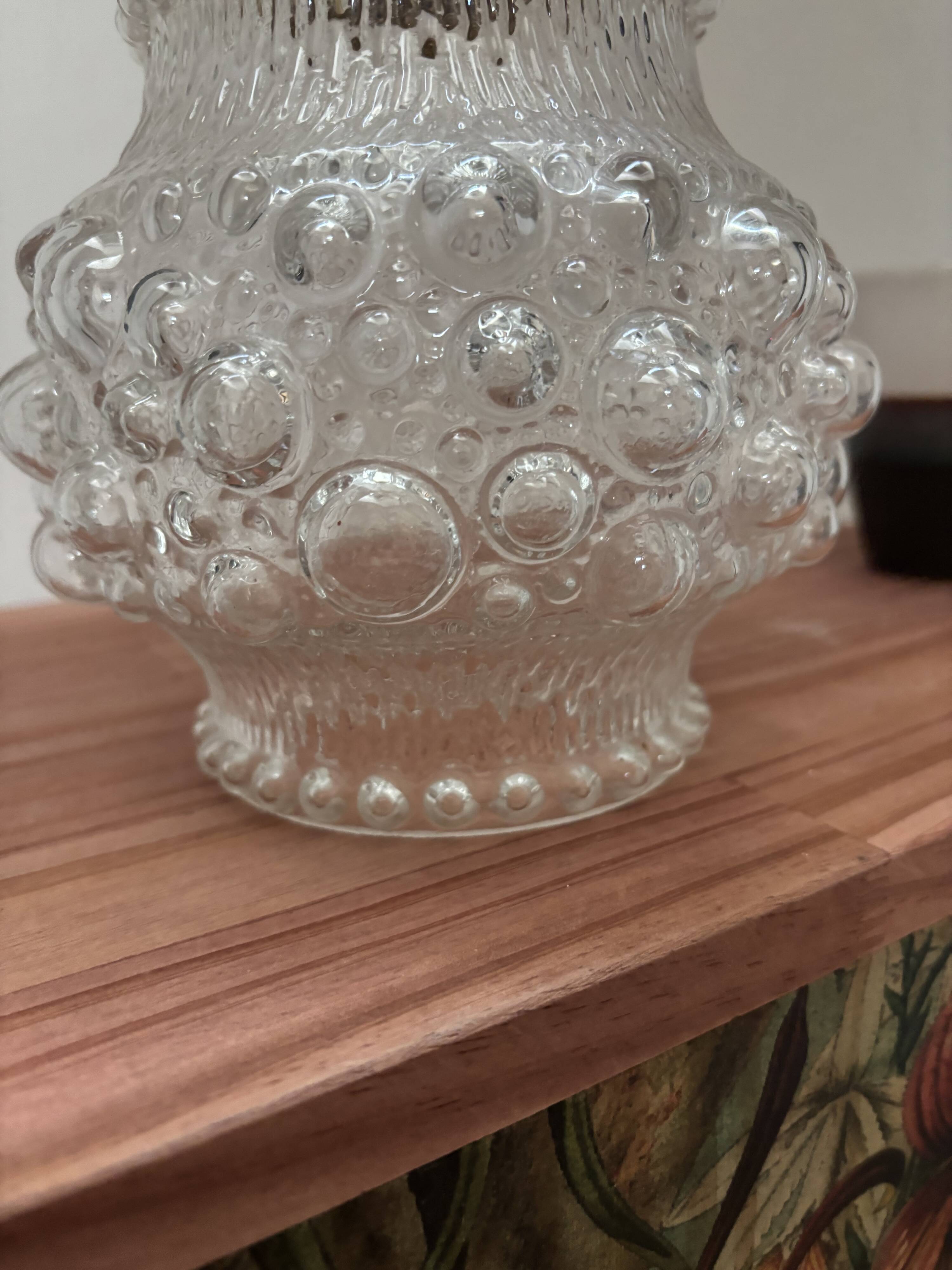 Gold wall light with bubble glass